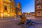 Architecture of the old town of Gdansk with bronze lions statues - emblem of the city, Poland