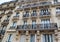 Architecture of Paris France. Facades of a traditional apartment buildings