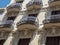 Architecture in Reus. Beautiful balconies of old building. Catalonia, Spain