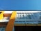 Architecture of A Tall Hospital Building with Lots of Windows and Bright Clear Blue Sky Background