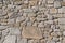 Architecture textures, detailed view of a traditional paired granite masonry, used on a fortress castle wall