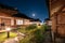 Architecture traditional wooden house illumination with the moon in blue sky at Ojuk Hanok Village