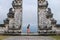 Architecture, traveling and religion. Young traveler enjoying the view in Hindu temple Lempuyang in Bali, Indonesia