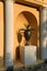 Architecture vintage concept. Arched and Decorated Niche in Stone Wall with vase