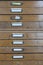 Archive with many vintage wooden drawers
