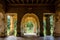 Archway of an abandoned mansion in malaysia during daytime