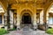 Archway of an abandoned mansion in malaysia during daytime