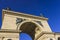 Archway in Munich with blue sky background