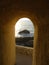 Archway view over rocky shore