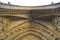 Archways carved on one of the external walls of Westminster Abbey founded by Benedictine monks in