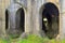 Archways in an old ruined industrial building