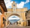 Arco de Santa Catalina and colonial houses in tha street view of