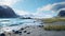 Arctic Beachfront: A Serene And Tranquil Landscape With Majestic Mountains