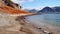 Arctic Char Beachfront: Orange Colored Rocks And Coastal Scenery