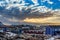 Arctic houses growing on the rocky hills in sunset panorama. Nuuk, Greenland