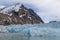 Arctic landscape glacier slipping into the bay on Spitsbergen archipelago