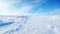 Arctic Meadow: A Stunning Winter Landscape Under A Blue Sky