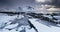 Arctic winter panoramic landscape and frozen rocky sea shore Lofoten islands Norway