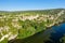 The Ardeche flows below the town of Aigueze in Europe, France, Ardeche, in summer, on a sunny day