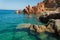 Ardinia Coastline: Typical Red Rocks and Cliffs near Sea in Arbatax; Italy at summer