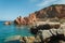 Ardinia Coastline: Typical Red Rocks and Cliffs near Sea in Arbatax; Italy at summer