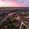 Areal countryside sunset view with river Venta