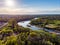 Areal countryside view from drone with small river Venta