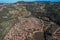 Areal view of land with olive trees, road and wine yards, farms of wine makers in Italia, Monte Argentario
