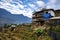 An areal view of a rural landscape lined with small, rustic houses: Sapa, Northern Vietnam