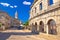 Arena Pula historic Roman amphitheater arches and church view