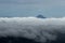 Arenal Volcano peaking thru the clouds