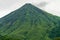 Arenal Volcano, which has an almost perfect cone shape, is one of the biggest tourist attraction in Alajuela, Costa Rica