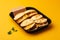 Arepas tasty fast food street food for take away on yellow background