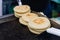 Arepas, traditional Venezuelan corn patties, at a street food market.