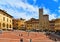 AREZZO, ITALY. Cityscape with Piazza Grande square in Arezzo with facade of old historical buildings and crowd of peopl