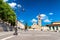 AREZZO, ITALY - MAY 12, 2015: People walk in Saint Augustin Square. Arezzo is one of the most famous tuscan medieval cities