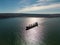 arge bulk carrier transports grain at sea, aerial view