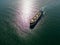 arge bulk carrier transports grain at sea, aerial view