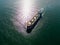 arge bulk carrier transports grain at sea, aerial view
