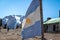 Argentina flag with Cerro Tolosa Mountain on background in Cordillera de Los Andes - Mendoza Province, Argentina