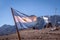 Argentina flag with Cerro Tolosa Mountain on background in Cordillera de Los Andes - Mendoza Province, Argentina