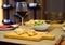 Argentine empanadas with wooden background and green salad