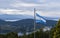 Argentine flag with mountains in the background