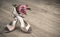 Argentine tango shoes and a rose on a wooden floor, space