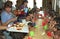 Argentinian children eat in a soup kitchen