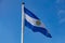 Argentinian flag waving against clear blue sky
