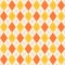 Argyle seamless pattern in classic orange shades. Fabric texture background with rhombuses, staggered. Argyle vector classic ornam