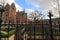 Arhitecture of Amsterdam. Rijksmuseum, Garden of famous dutch national museum. Garden alleys and shod fancing.