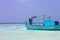 Ari Atoll, Maldives: A maldivian sailor is fishing on his boat