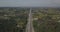 Arial view cars moving on highway on background field. 4k 4096 x 2160 pixels